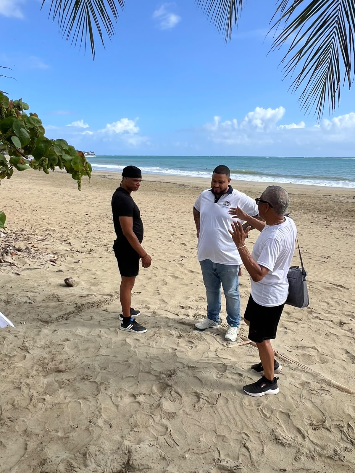 Wellness staff supporting veterans on Cabarete beach